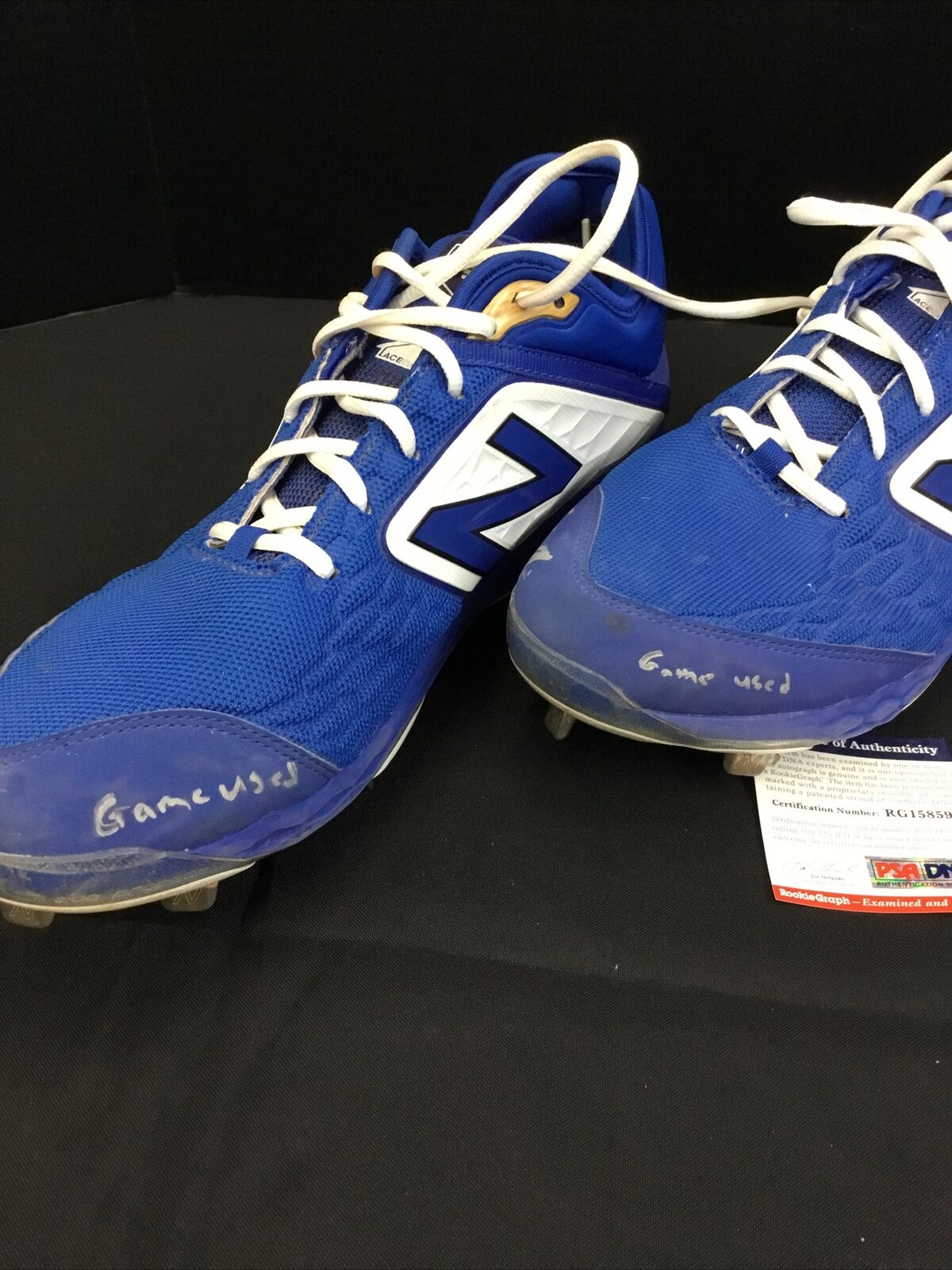 EDWIN RIOS DODGERS ROOKIE SIGNED AND INSCRIBED GAME USED CLEATS PSA RG15859 / 60