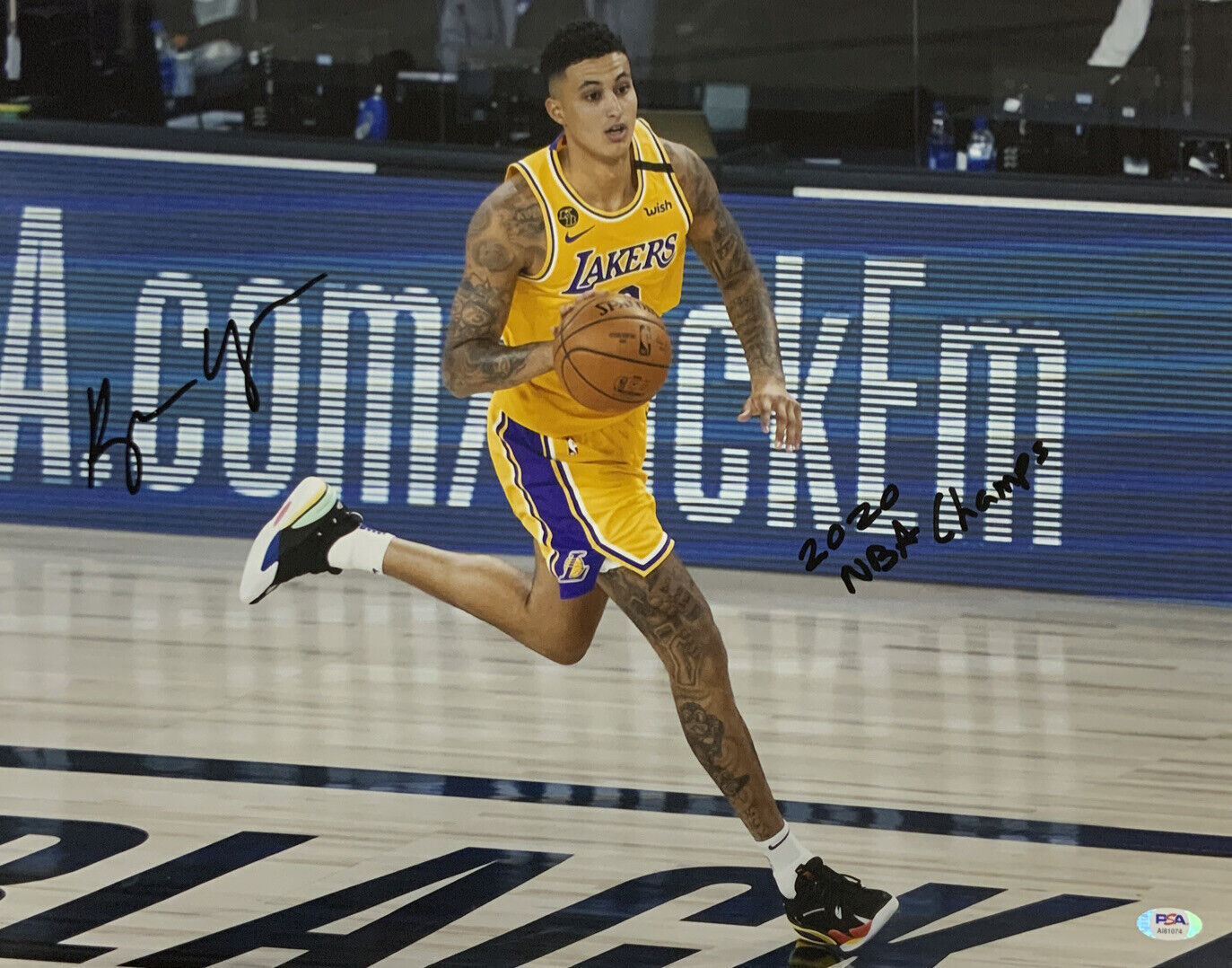 KYLE KUZMA LAKERS SIGNED 16X20 DRIBBLING PHOTO "2020 CHAMPS" INSCRIPTION PSA